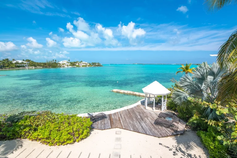 Deck and gazebo overlooking the turquoise bay at Sea Star Villa, George Town, Great Exuma