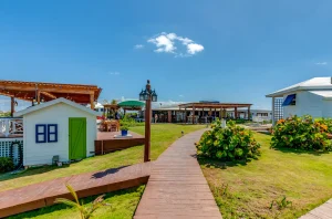 Walkway between cottages and lawn at Harbour View Cottage, Hope Town, Elbow Cay